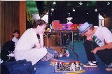 Ben trying not to drop a piece against Tim Kelly. Photo by thomasn